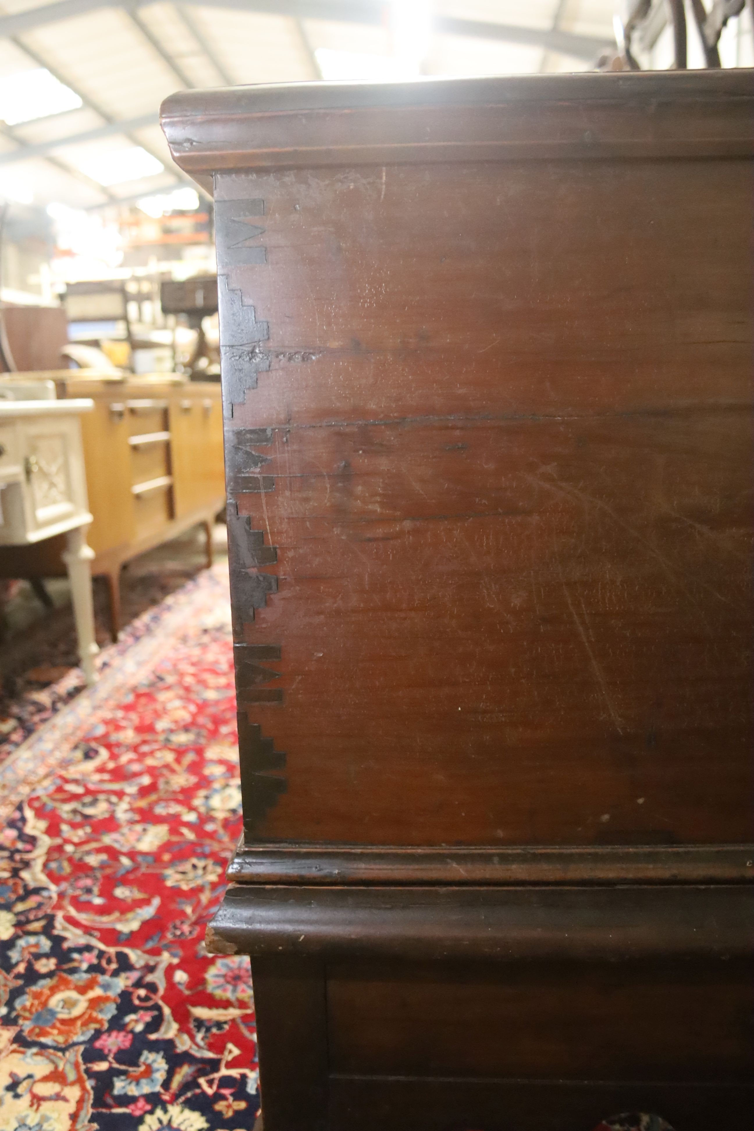 An 18th century Bermudian cedar coffer on stand, width 135cm, depth 60cm, height 86cm